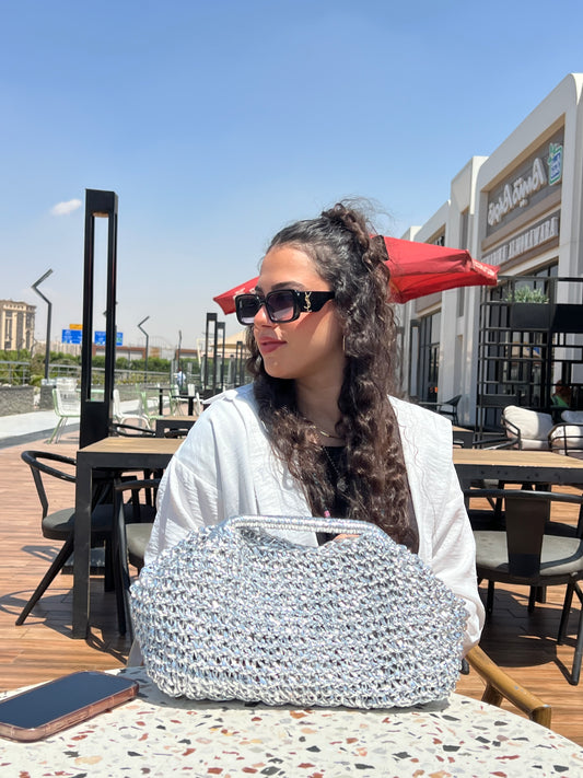 Silver lilly clutch